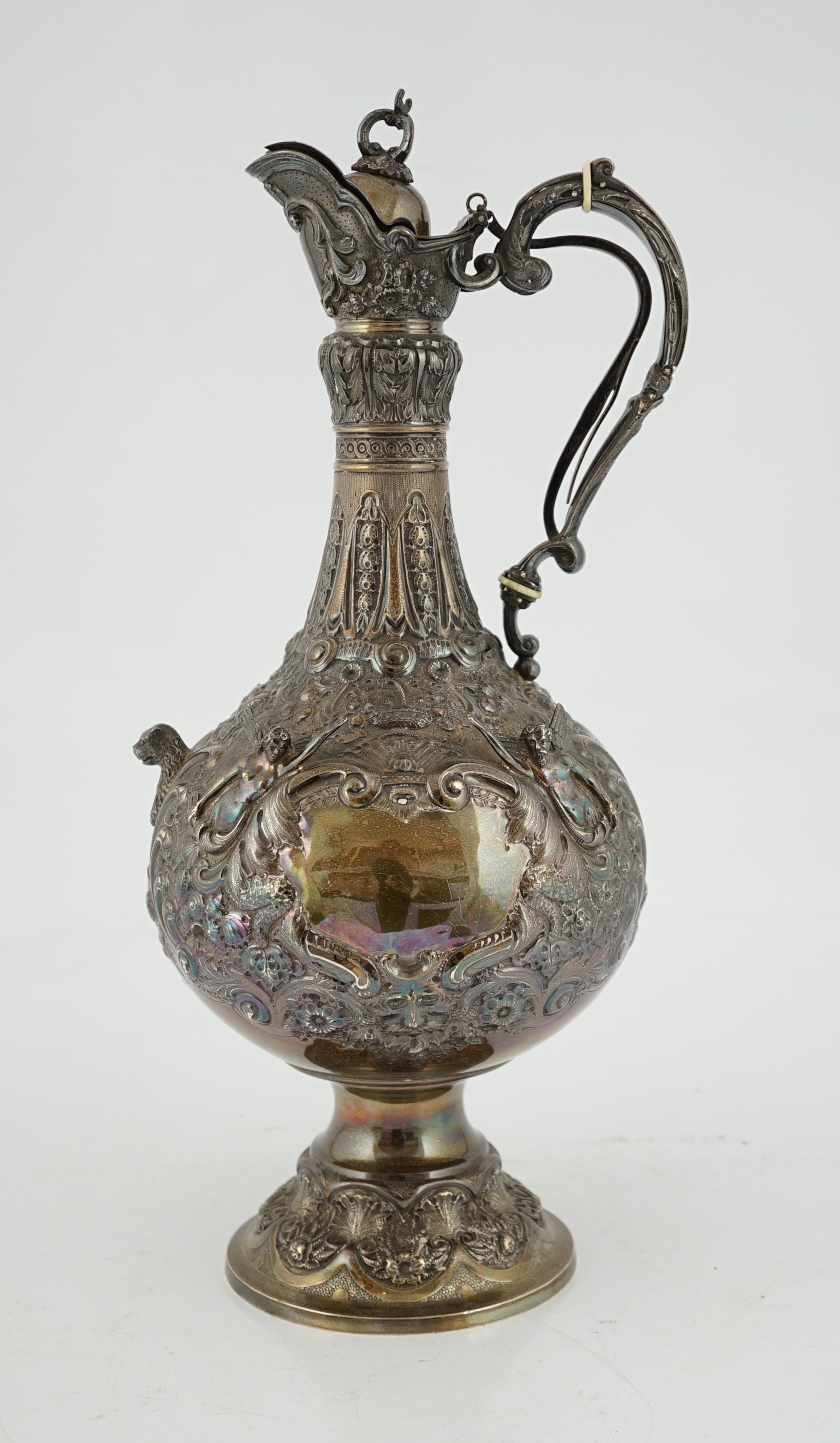 An ornate Victorian silver hot water jug, by Elkington & Co, CITES Submission reference UF9517NZ